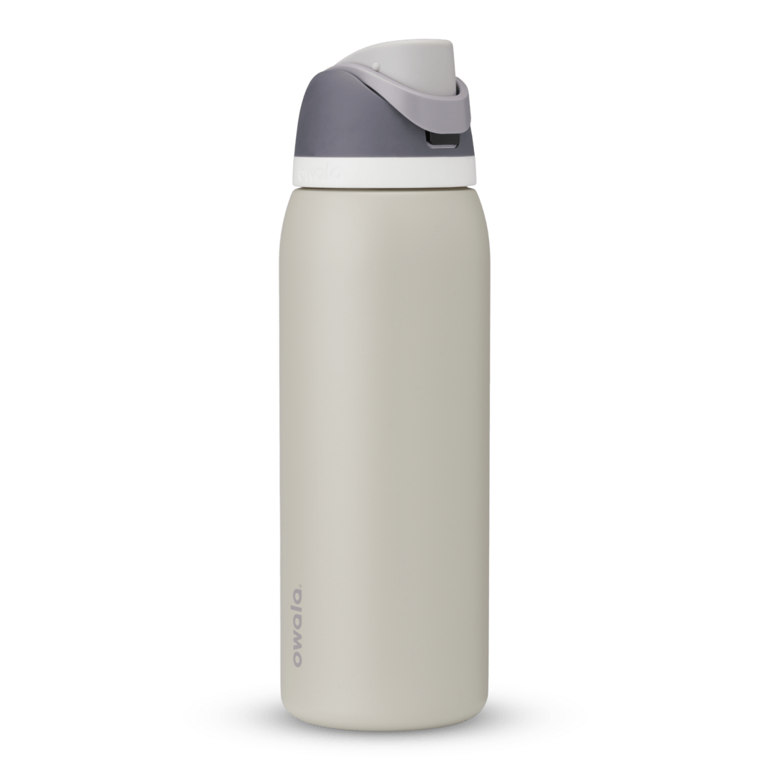 Full profile shot of the 40oz 'Rock On' FreeSip water bottle in grey and silt.